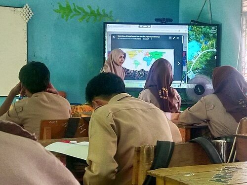 Students in a junior high school classroom in Indonesia